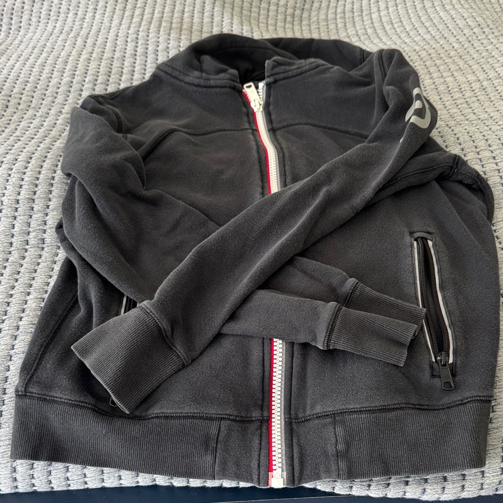 Peloton Black Zip-Up Jacket with White and Red Accents